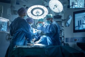 Medical Team Performing Surgical Operation in Modern Operating Room
